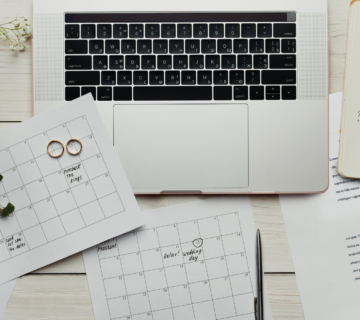 wedding planning with computer and calendar